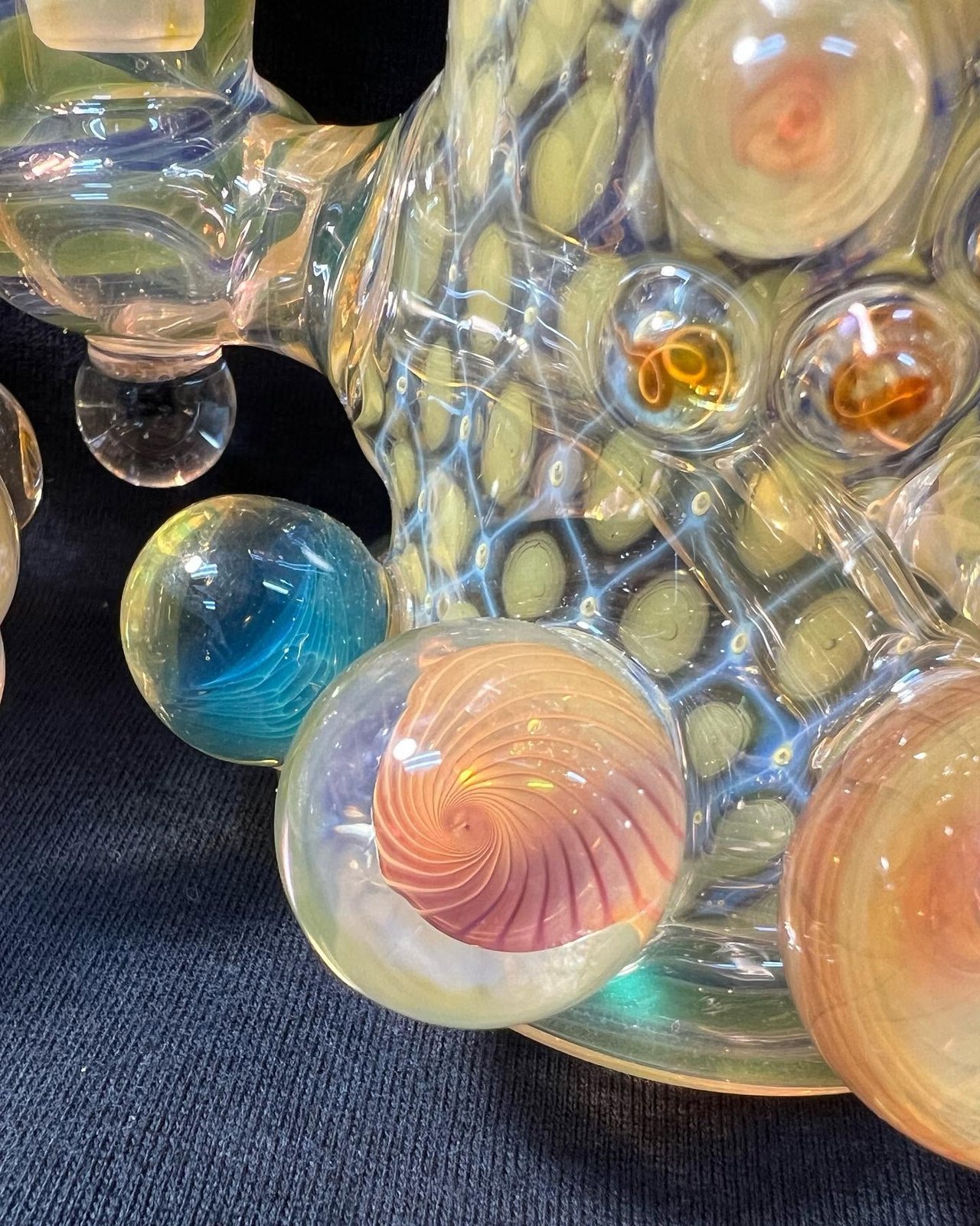 Worked marbles on a glass piece